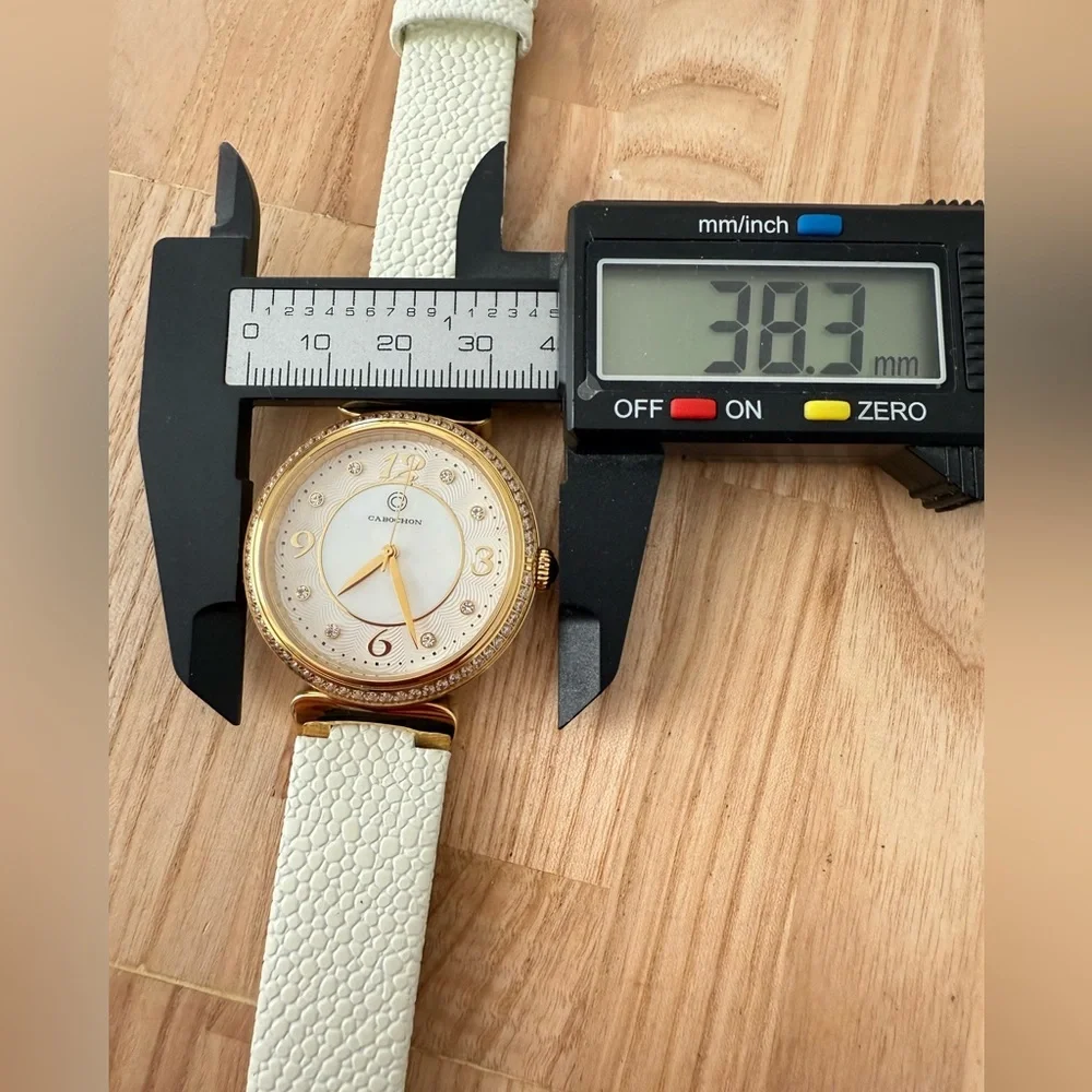Cabochon ladies gold tone white leather watch NEW BATTERY